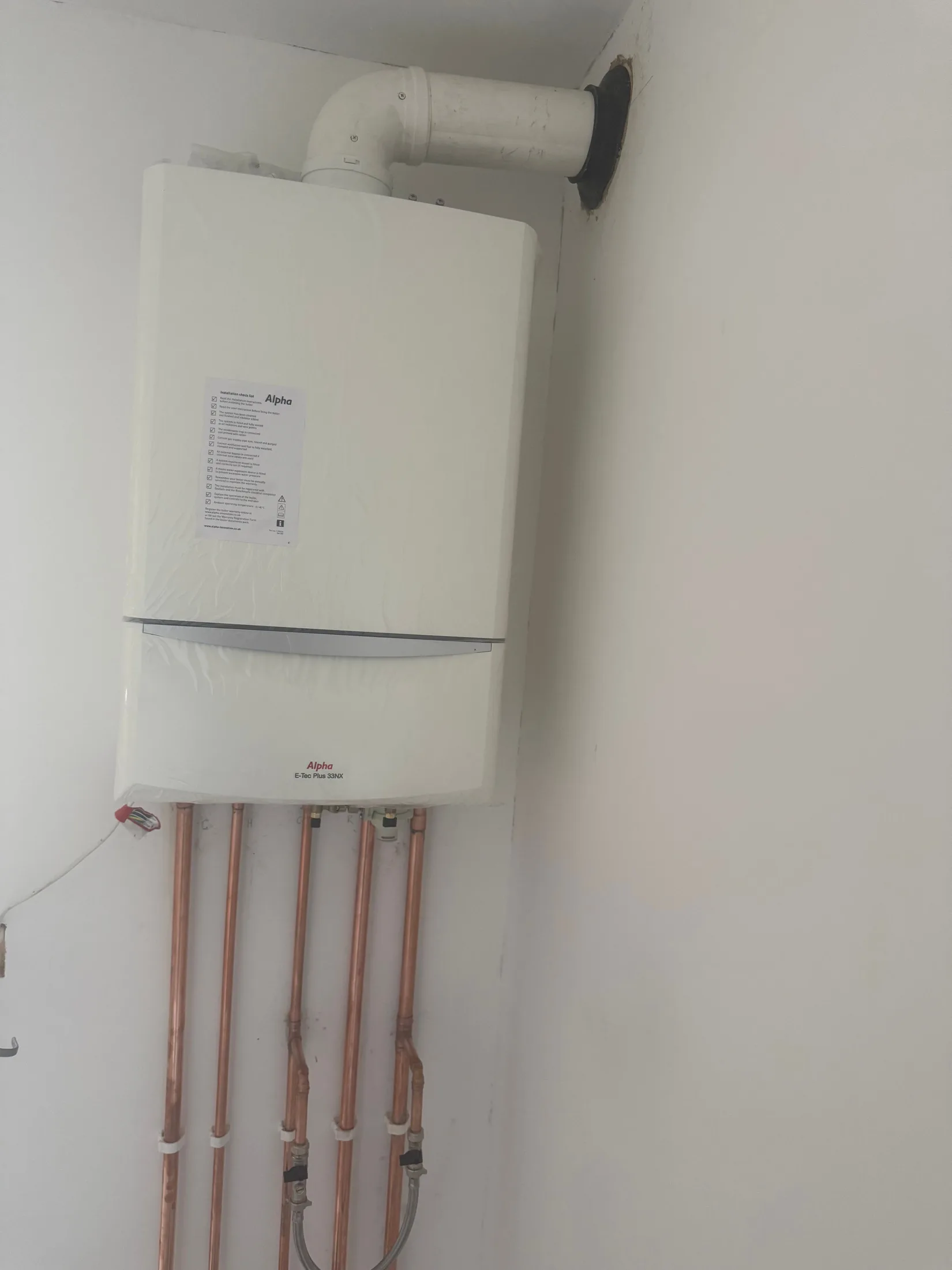 New Alpha E-Tec Plus boiler installation with fresh copper pipework