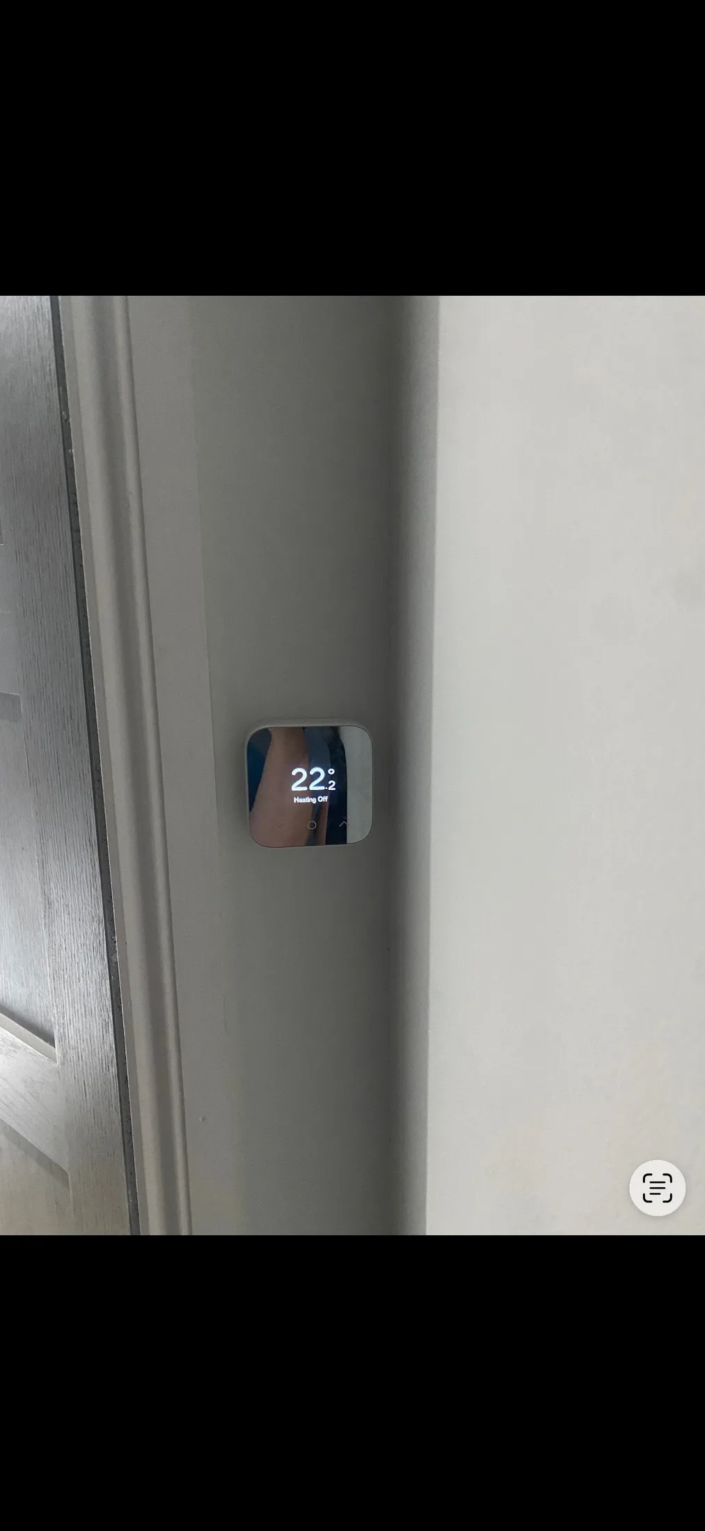 Smart room thermostat installed in a Glasgow home