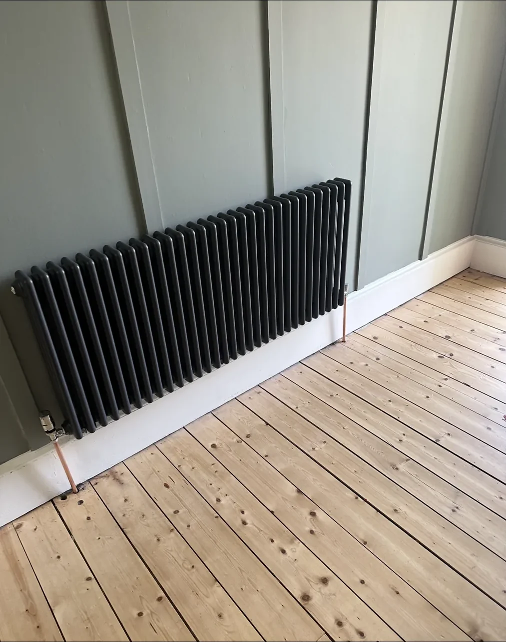 Heated towel radiator fitted in bathroom